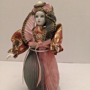 Porcelain mardi gras doll